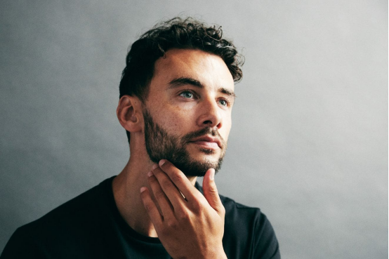 This daily beard oil ritual supports mental wellness as part of his self-care routine.